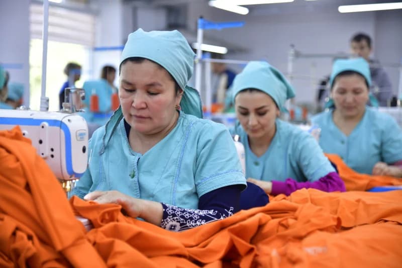 Women working at sewing machines in a factory