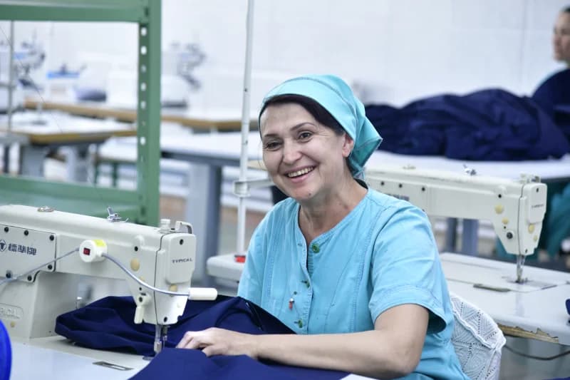 Woman working at a sewing machine