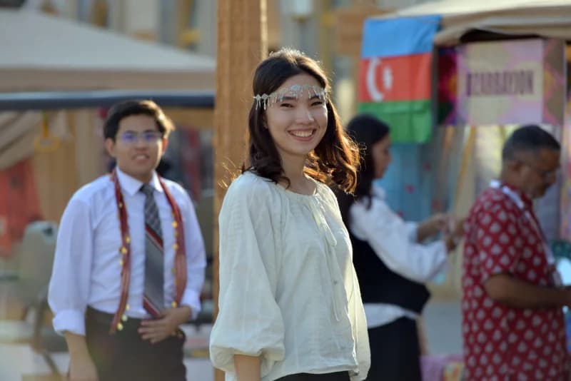 Young woman smiling outdoors