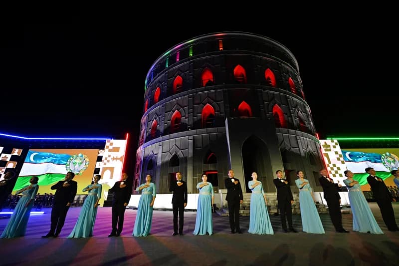 Performers on stage at night