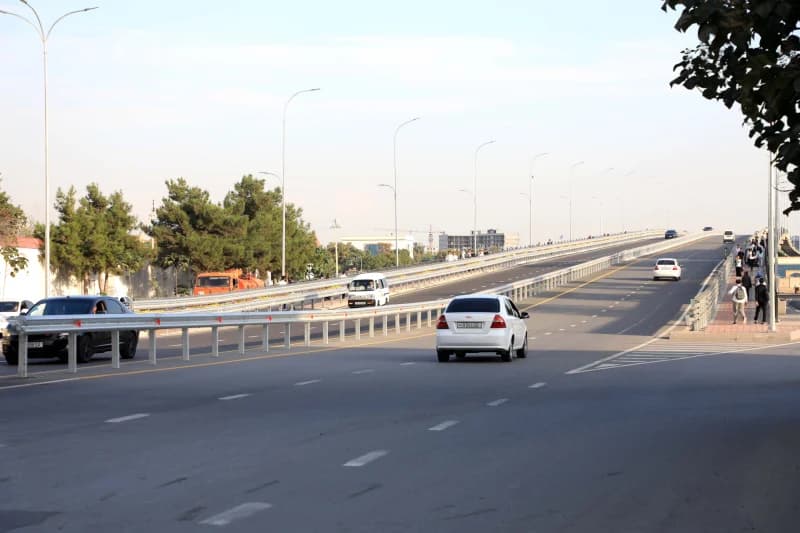 Cars driving on an elevated urban road bridge