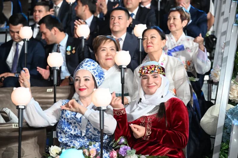 People in traditional clothing attending an event