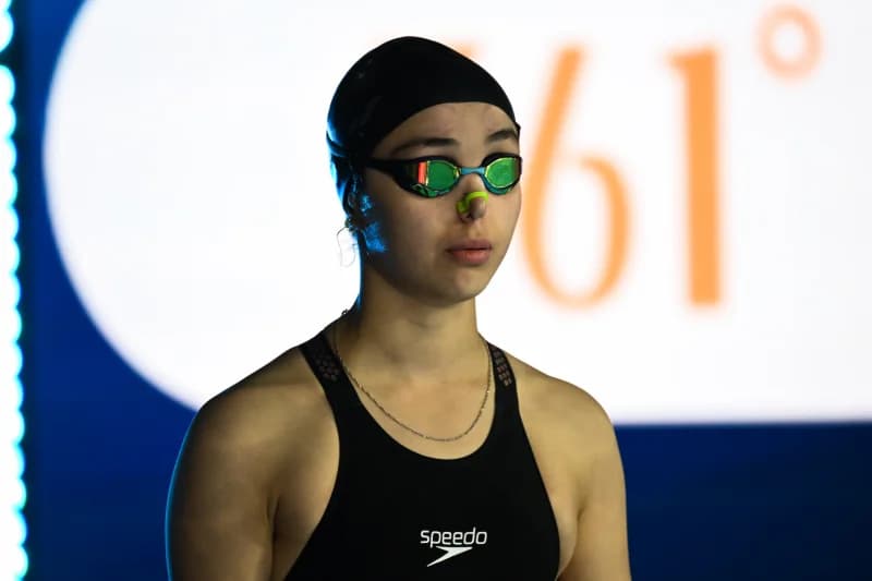Portrait of a female swimmer wearing goggles