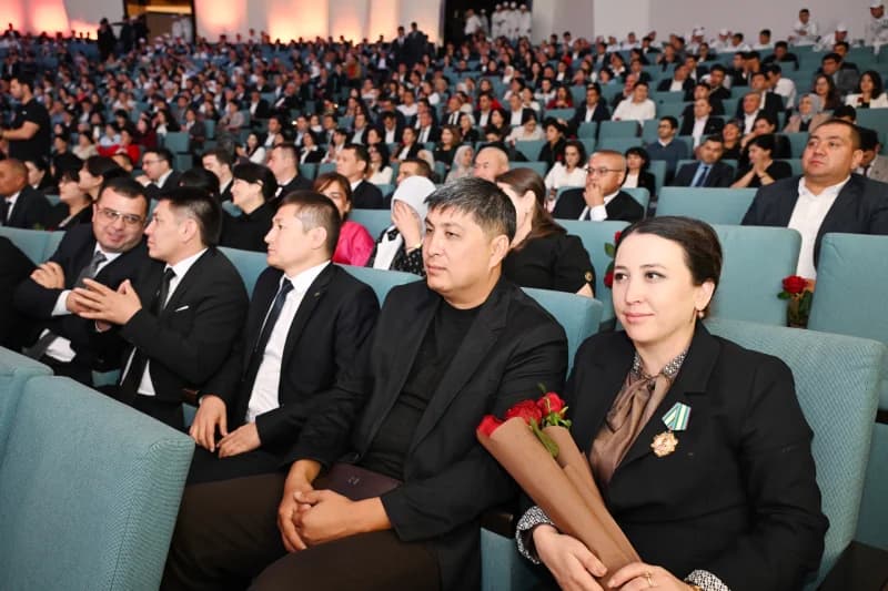 People seated in an auditorium