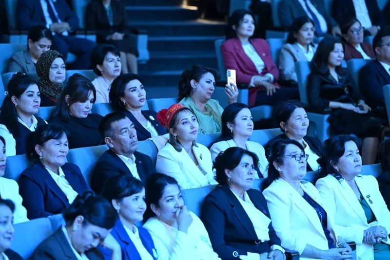 People seated in an auditorium