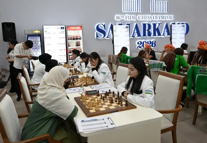 People play chess at a tournament