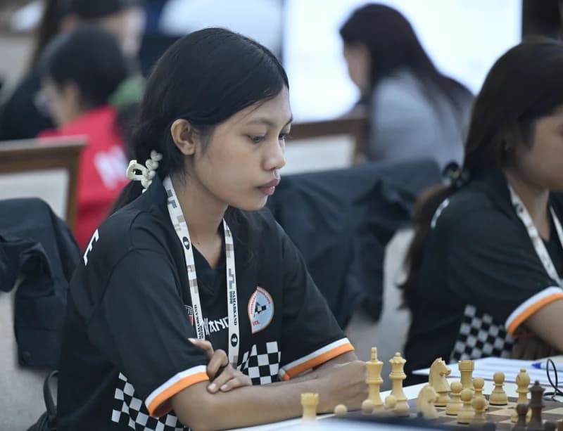 Young participant focused during a chess competition