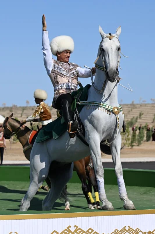 Man on horseback performing outdoors
