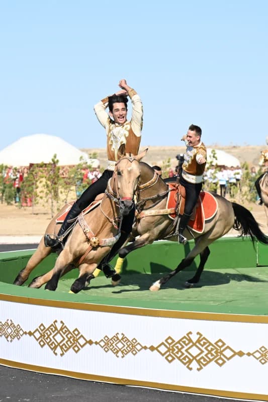 Performers on horseback during an outdoor cultural event