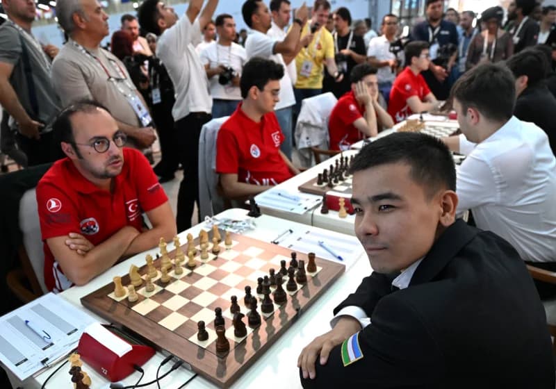 People participating in a chess competition