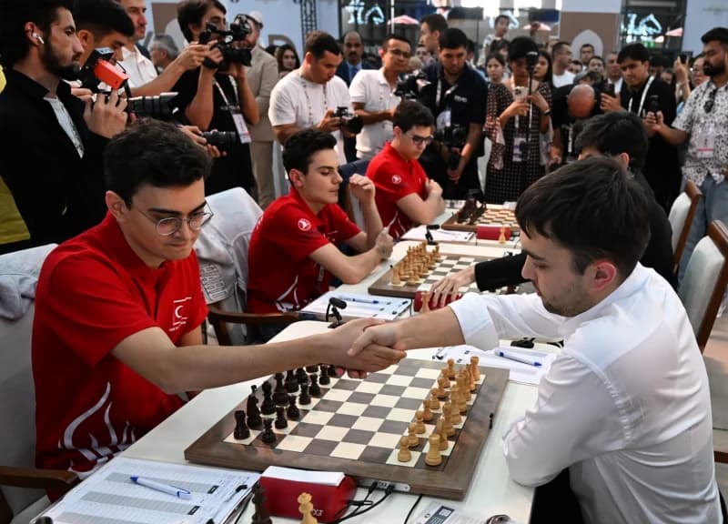 Chess players shaking hands during a match