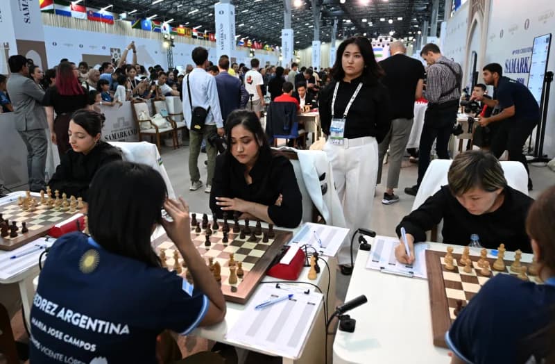 People playing chess at a competition venue