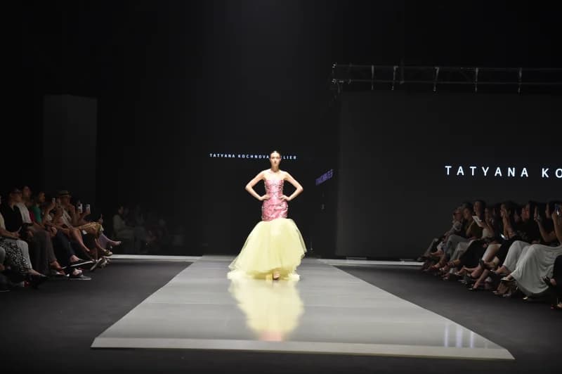 Model walking the runway during a fashion show