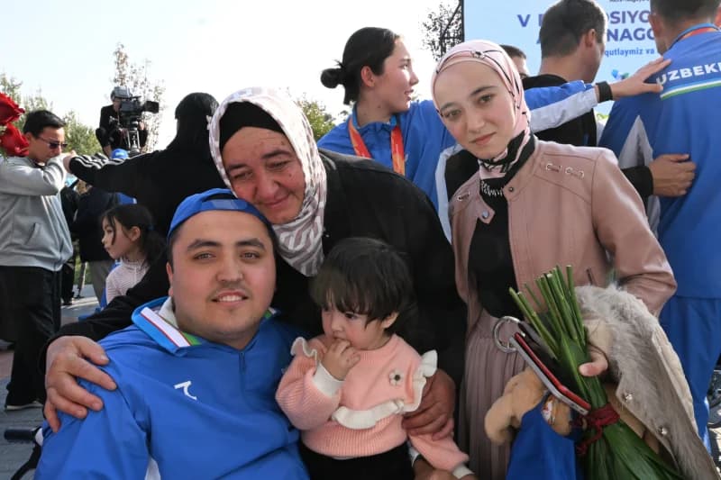 Family members posing together outdoors
