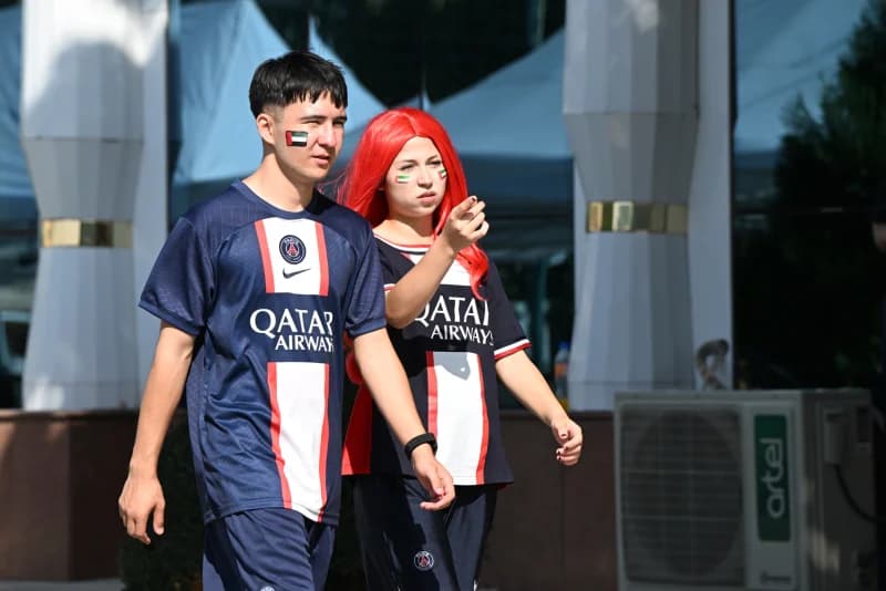 People in sports attire walking outdoors