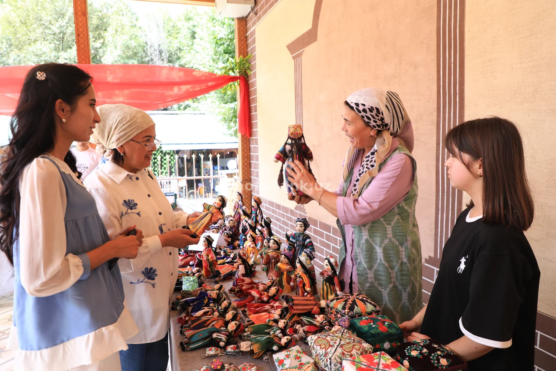 Artisan Demonstrating Traditional Handmade Dolls