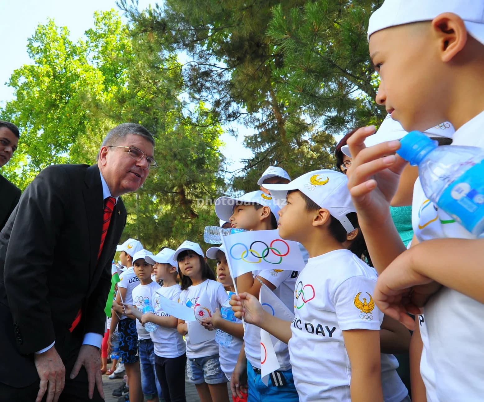 IOC President Thomas Bach meets children
