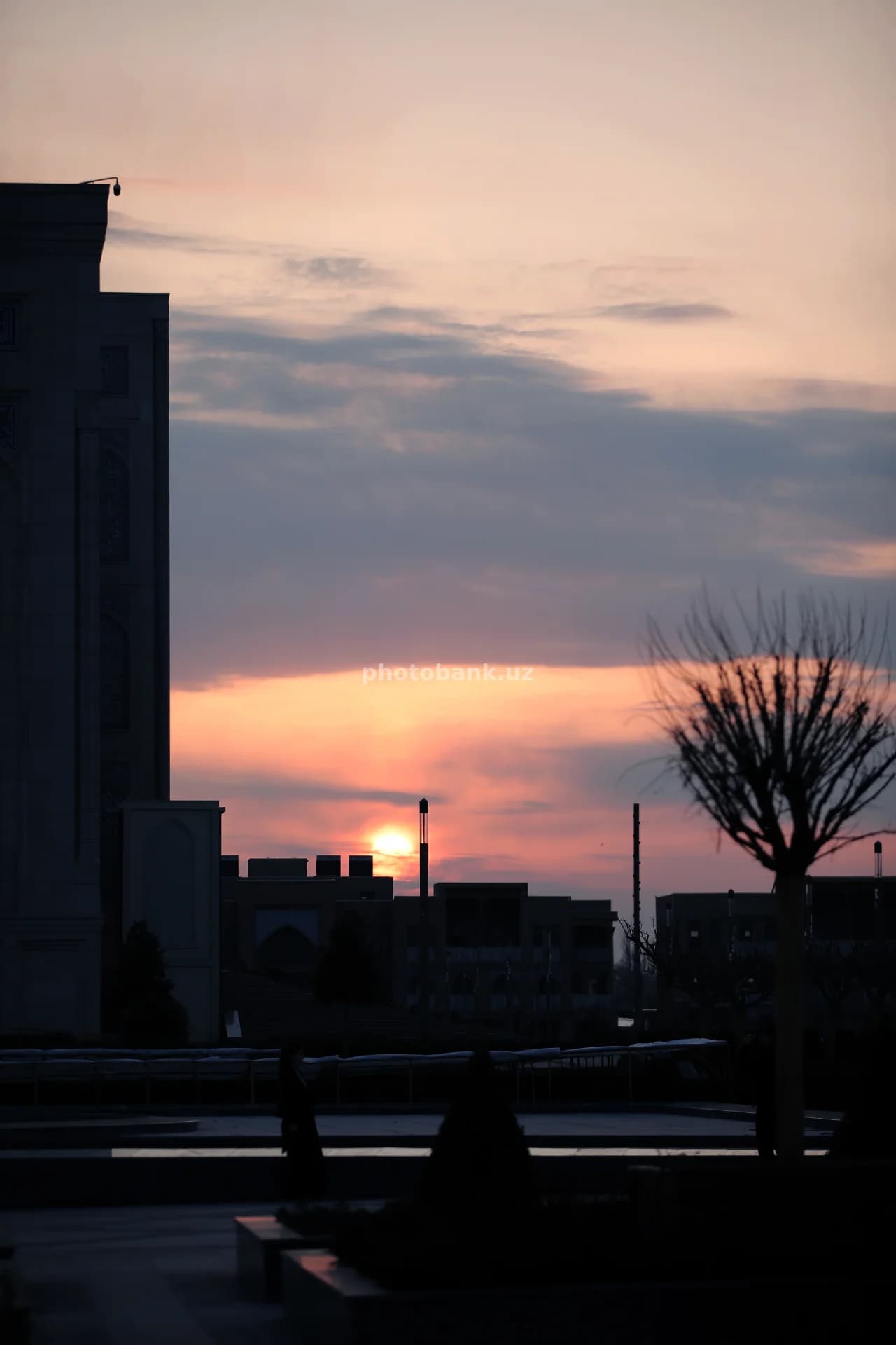 Sunset over city architecture