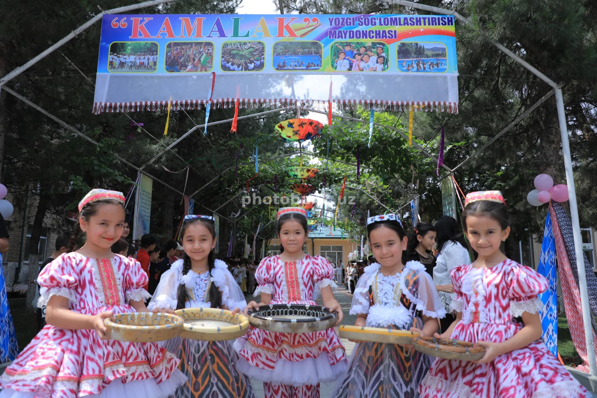 Children in Traditional Dress at Camp