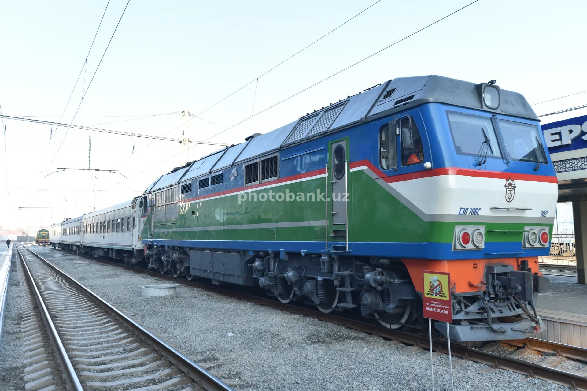 Uzbekistan Railways passenger train at station