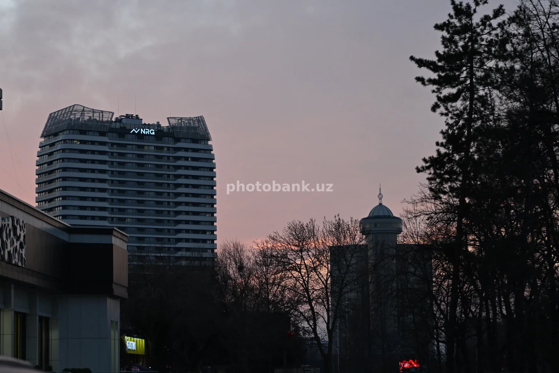 Modern High-Rise Building at Sunset