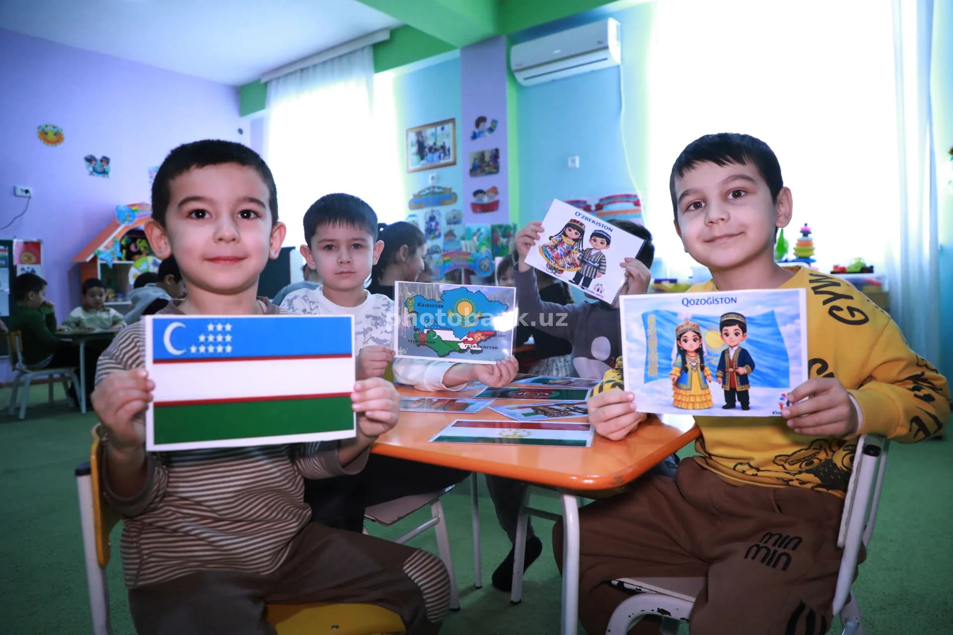 Children learning about Central Asian countries
