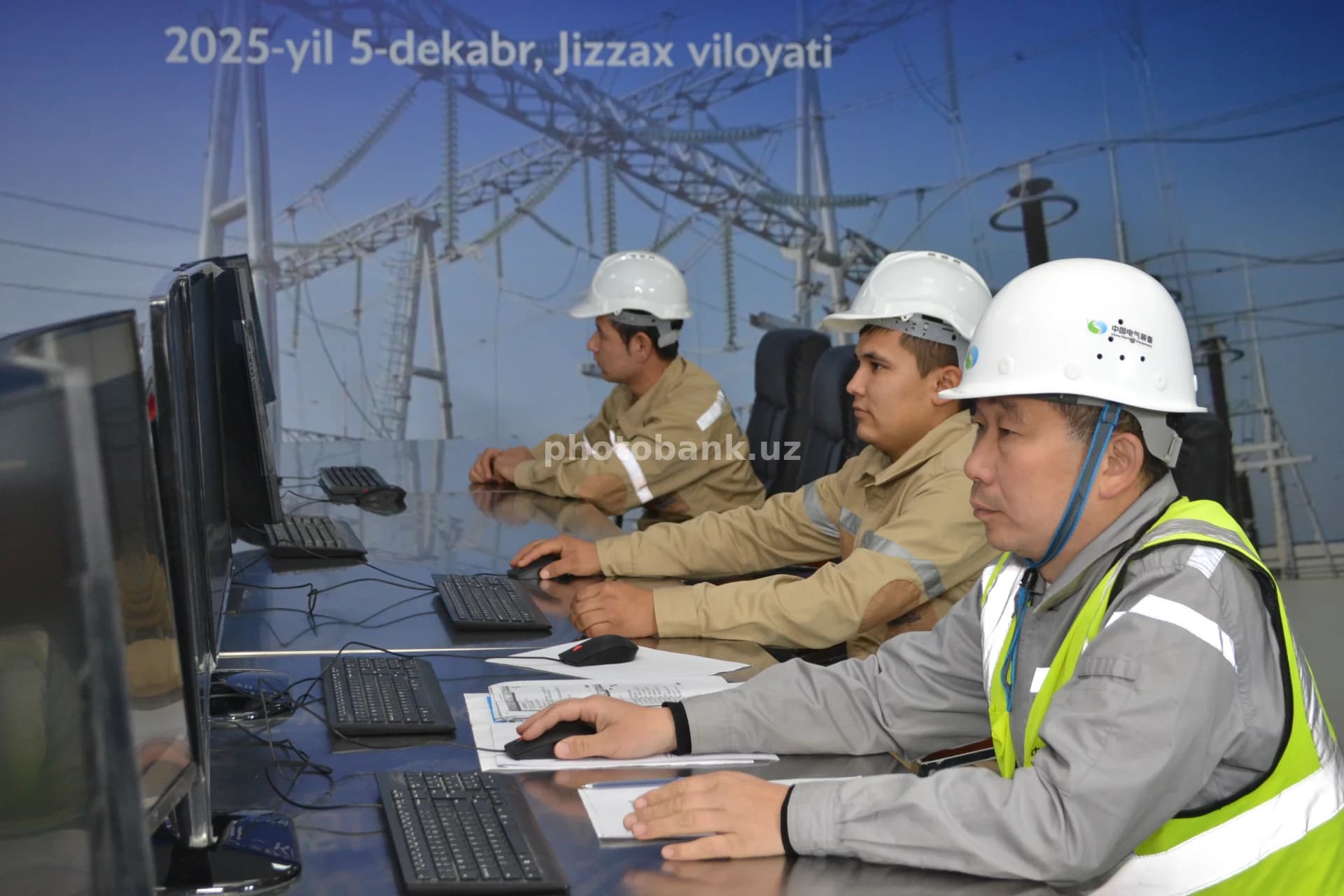 Engineers Monitoring Power Grid in Jizzakh