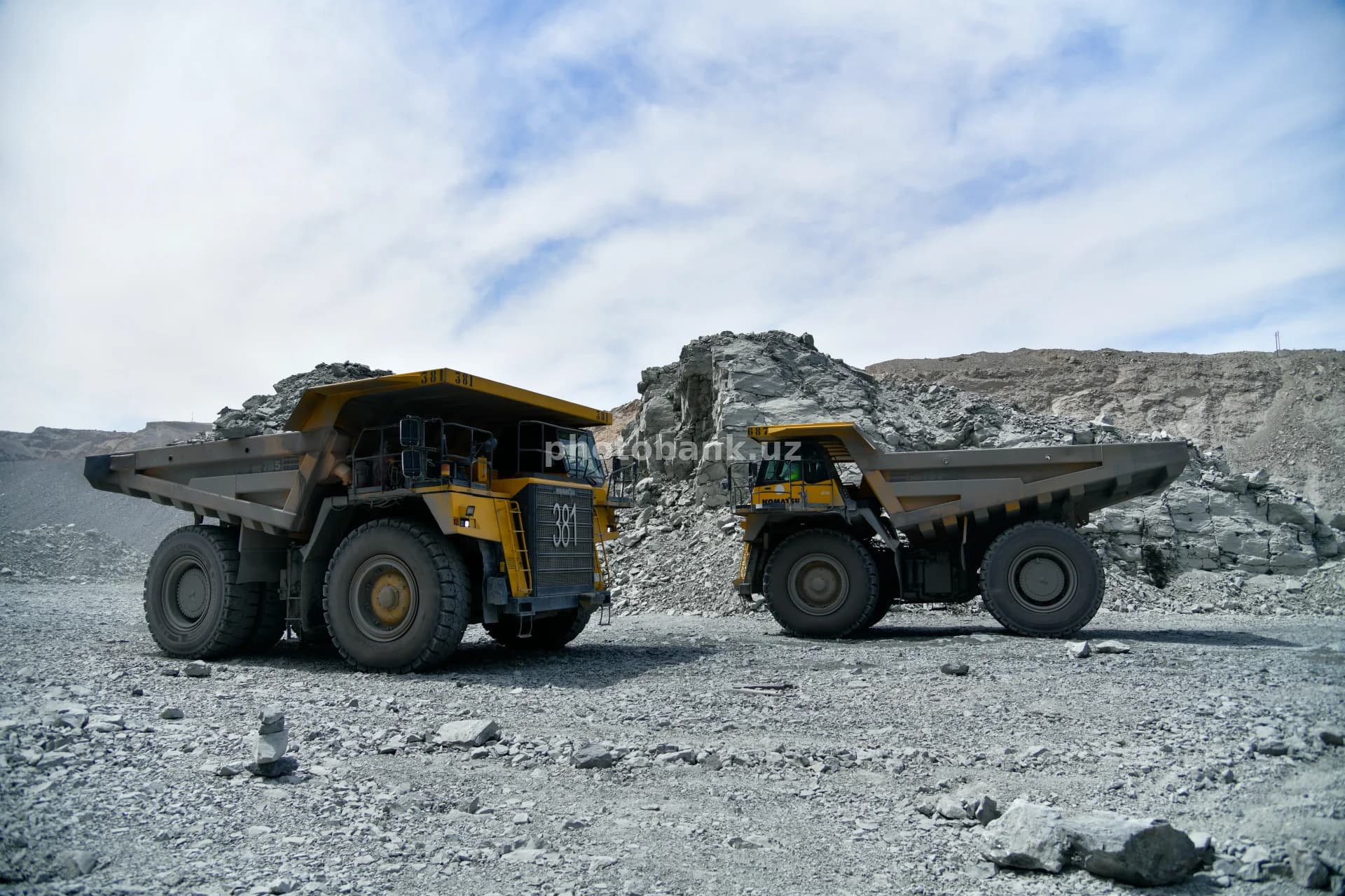 Heavy mining trucks at open-pit mine