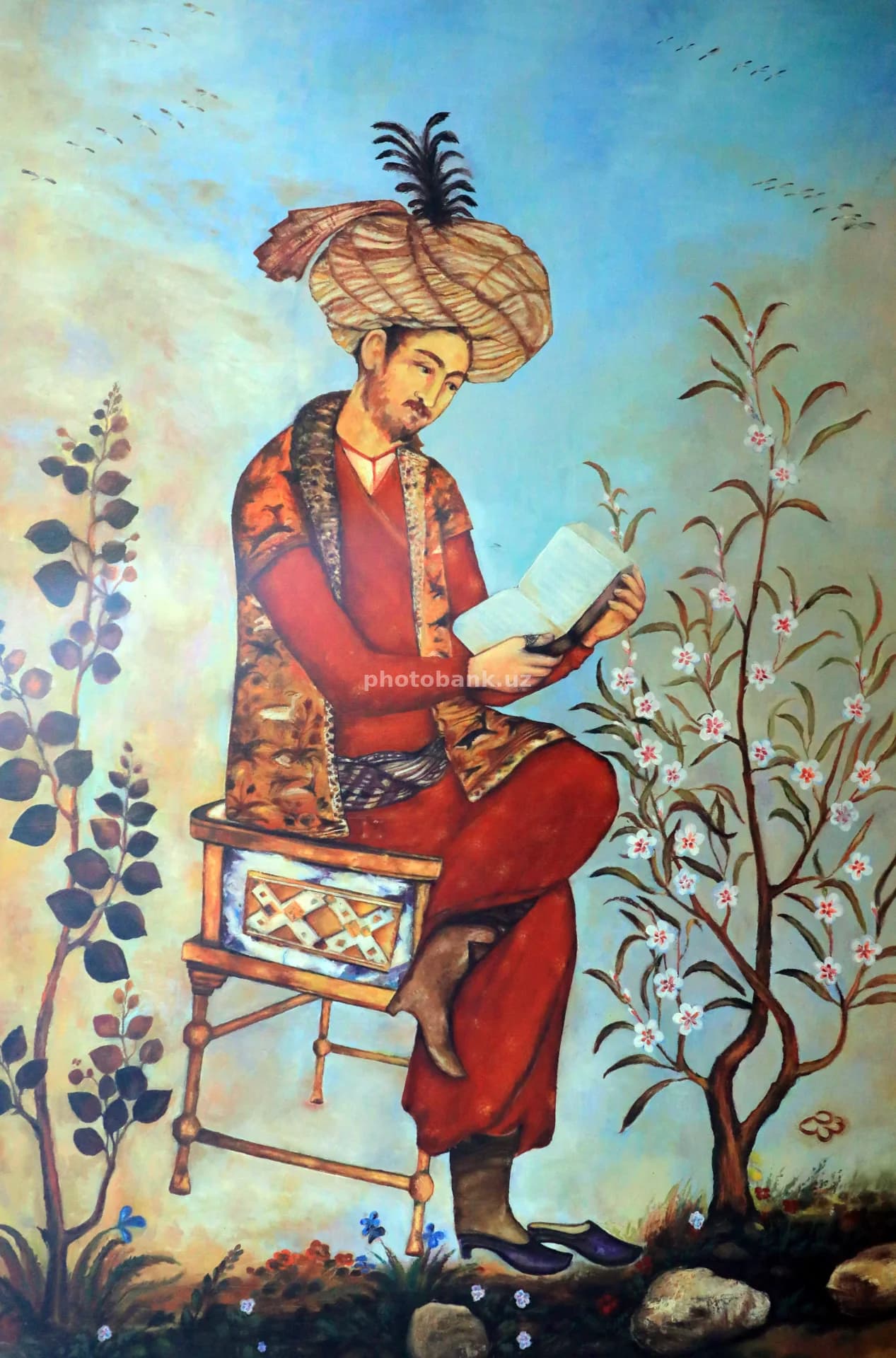 Man reading book in painting