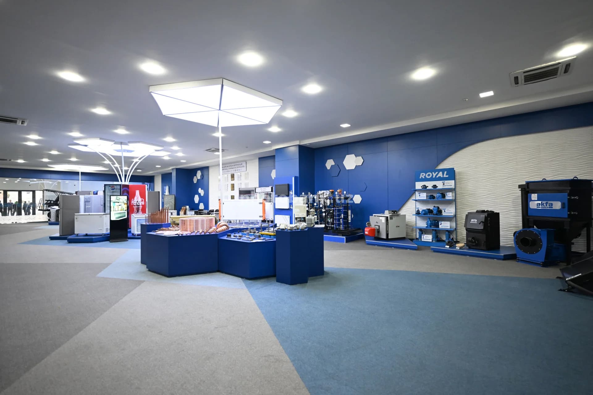 Visitors explore modern industrial showroom