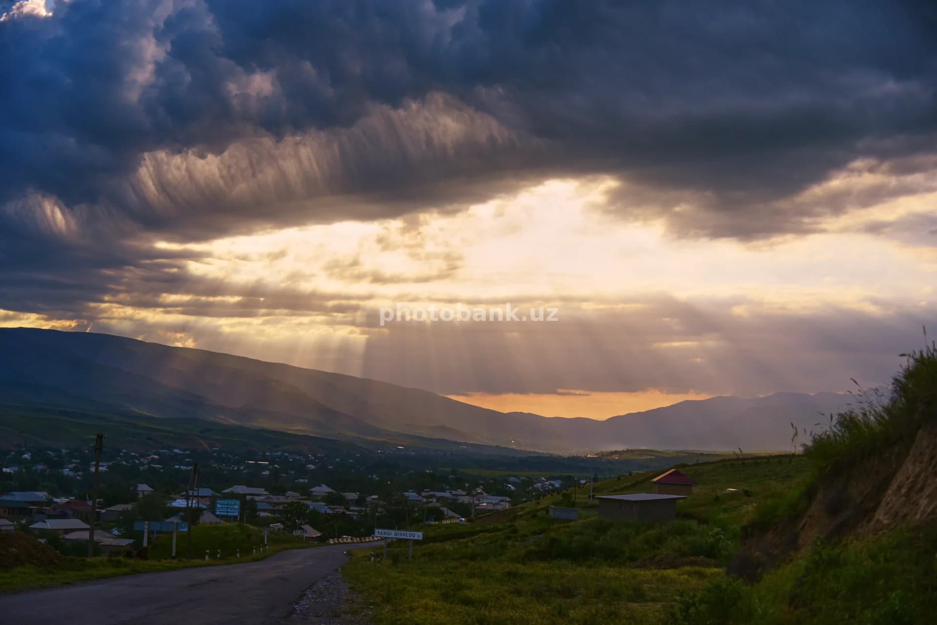 sunlight breaks through storm clouds