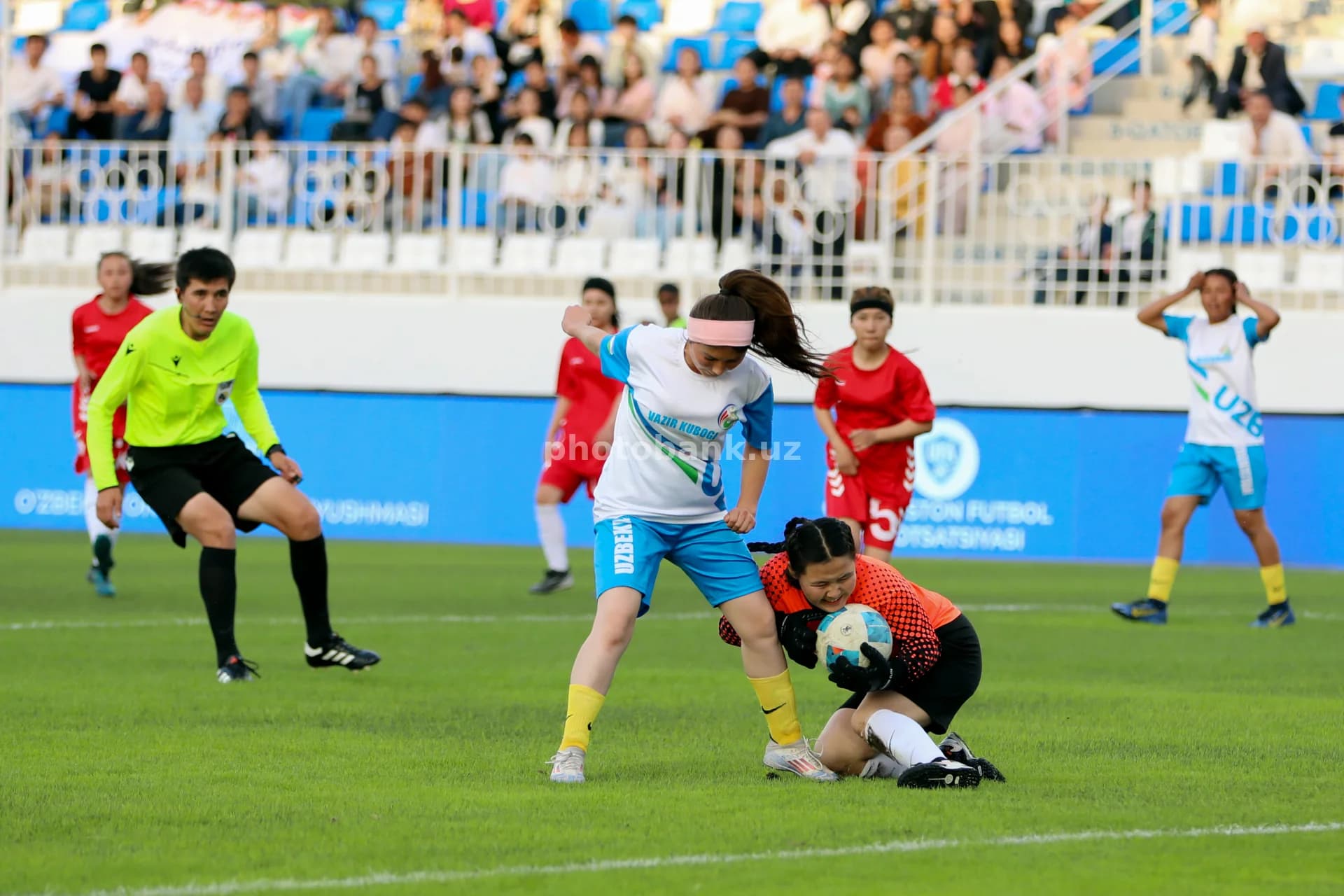 Female players competing for ball