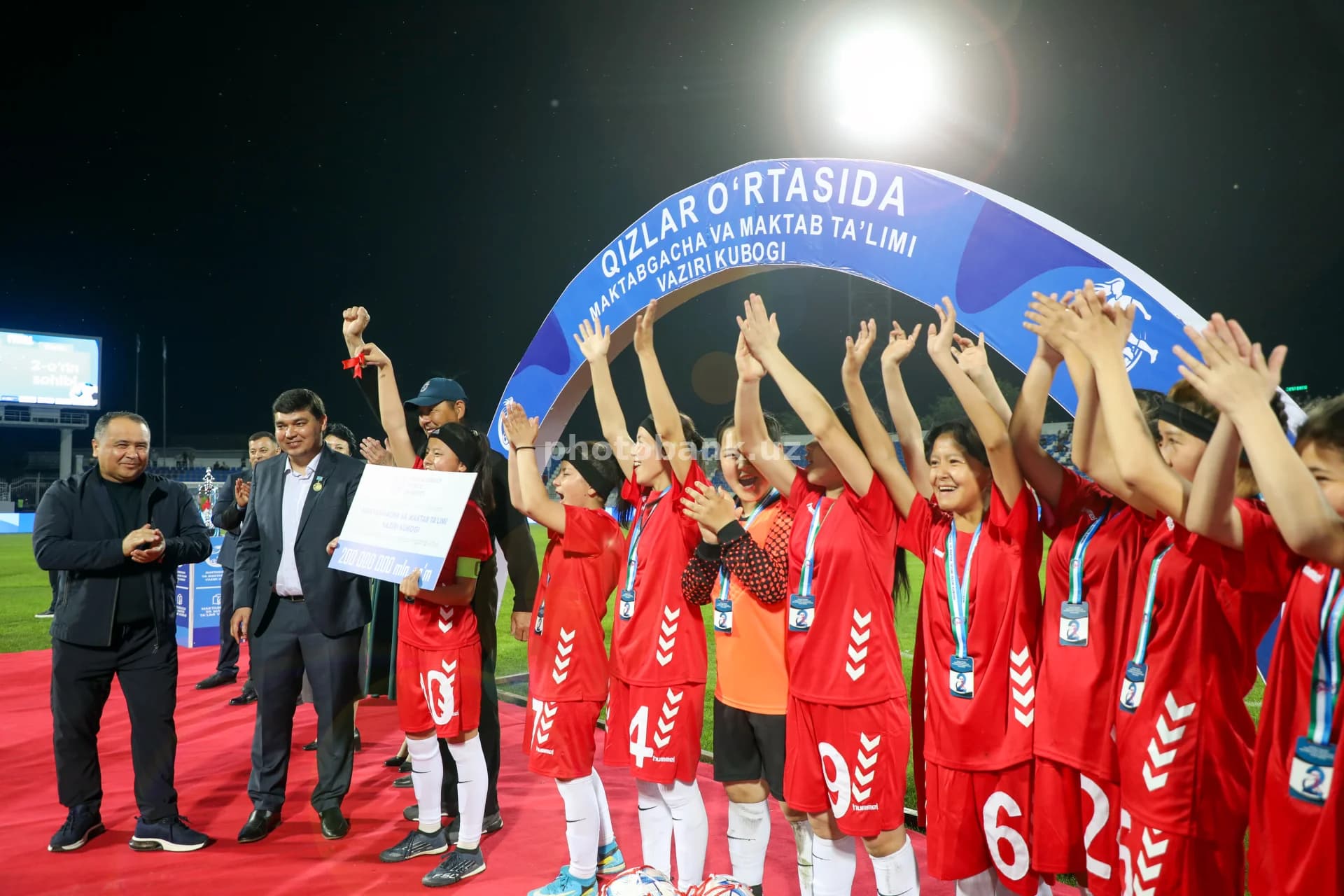 Female athletes celebrate tournament victory