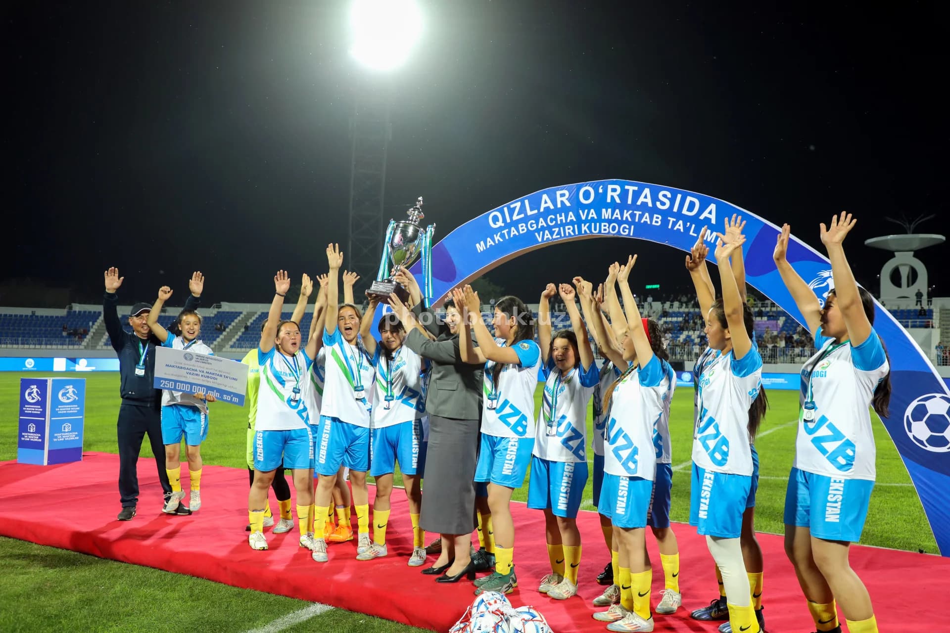 Female athletes celebrate tournament victory