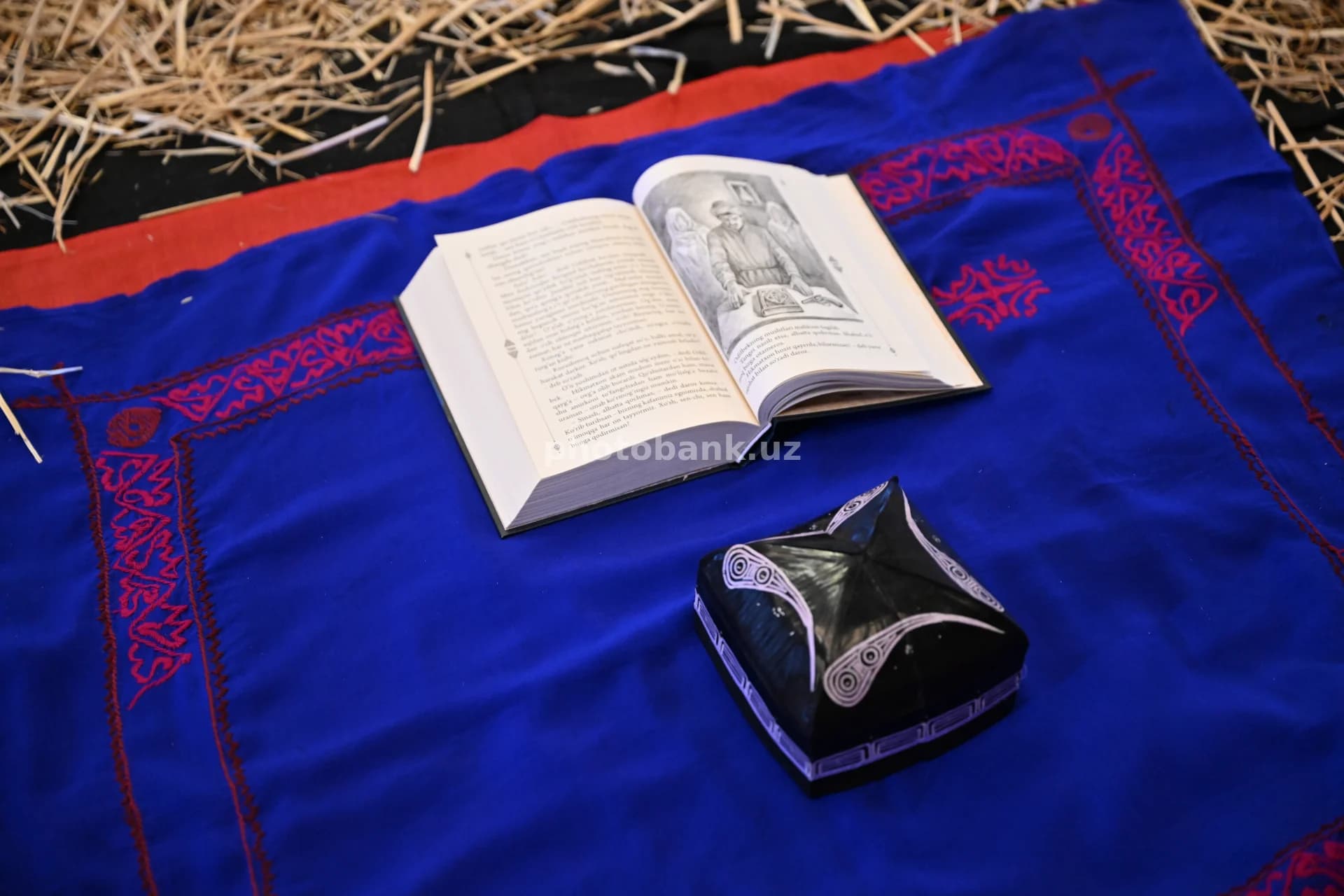 Open book rests on cloth
