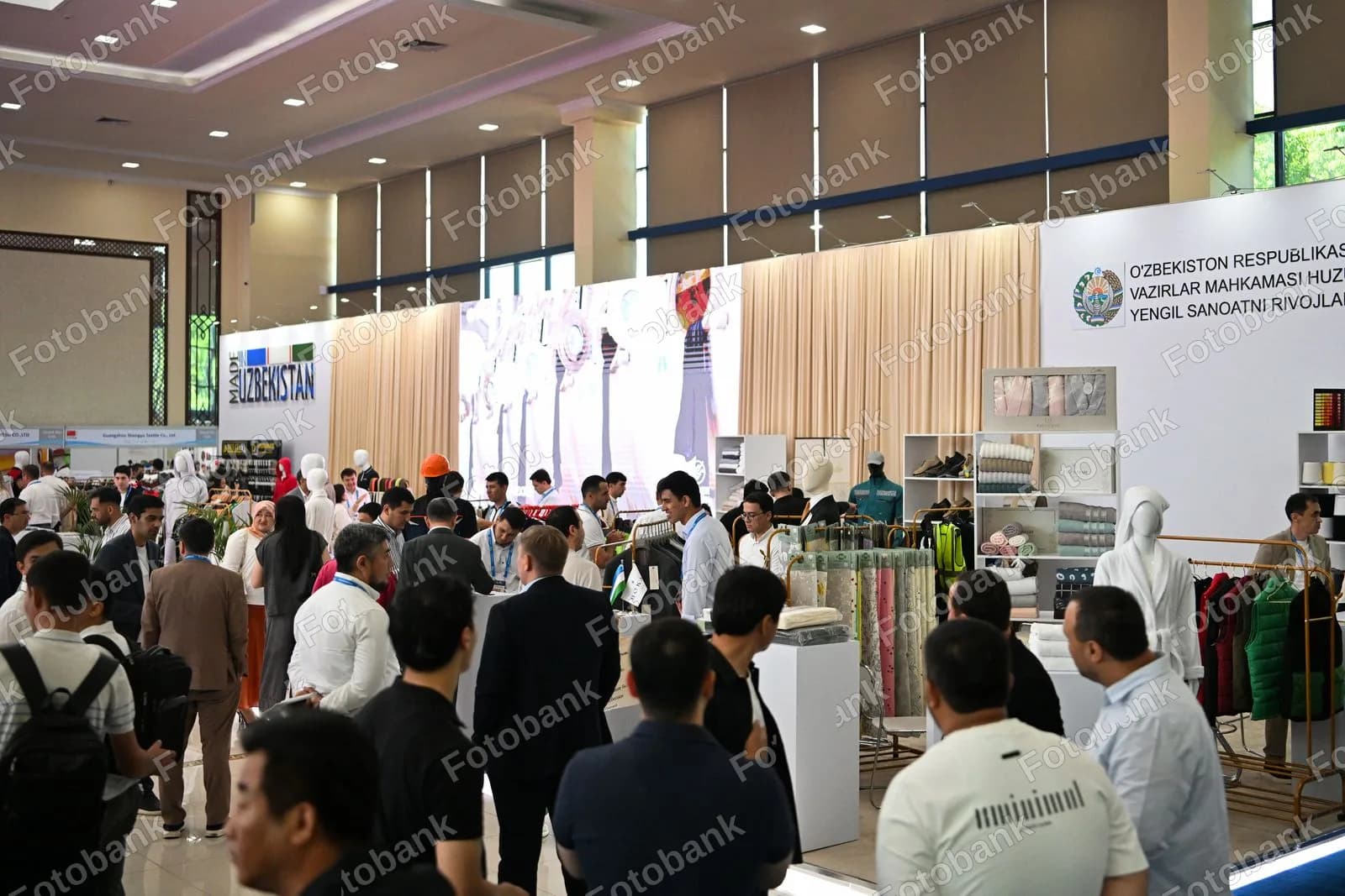 People visit textile industry exhibition