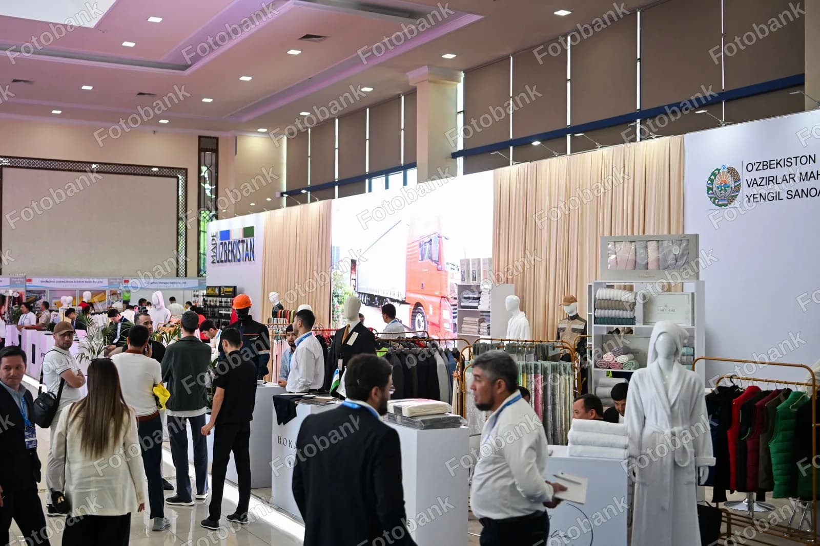 Visitors explore textile industry exhibition