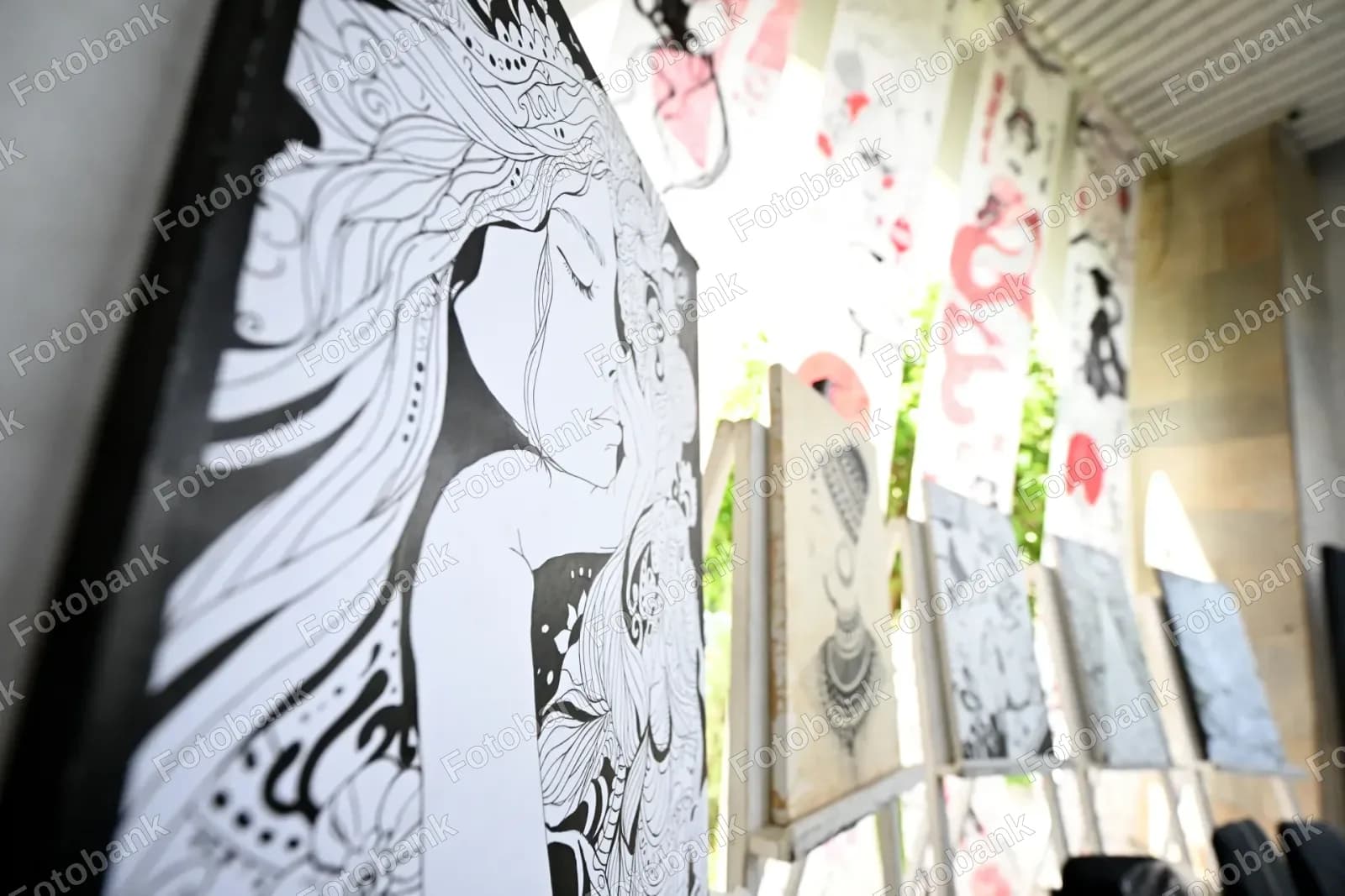Artist displays intricate ink drawings