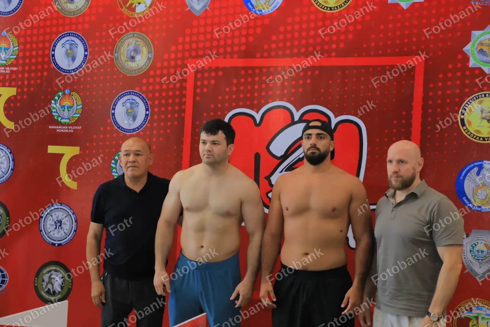Athletes stand for weigh in