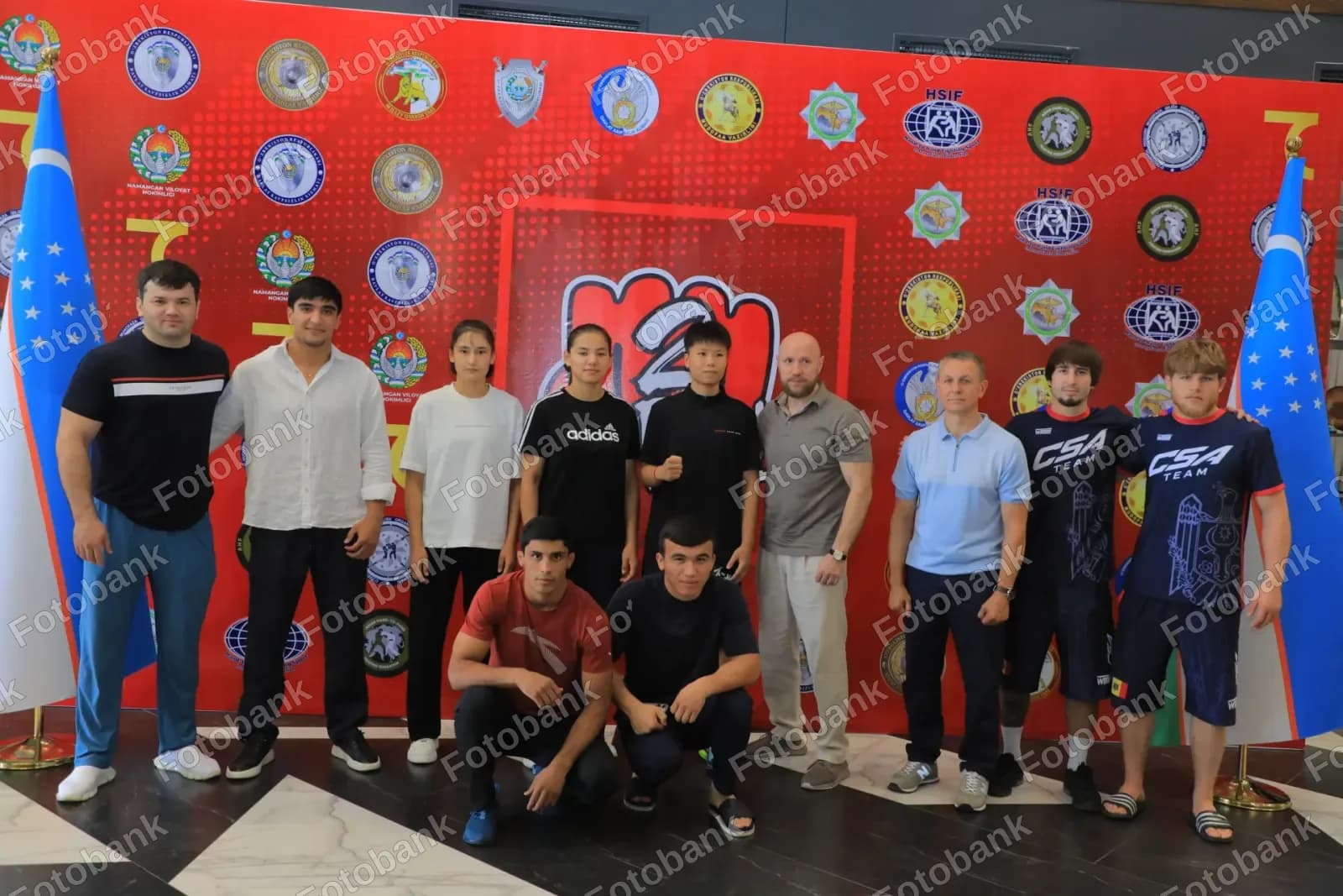 Athletes pose for group photo