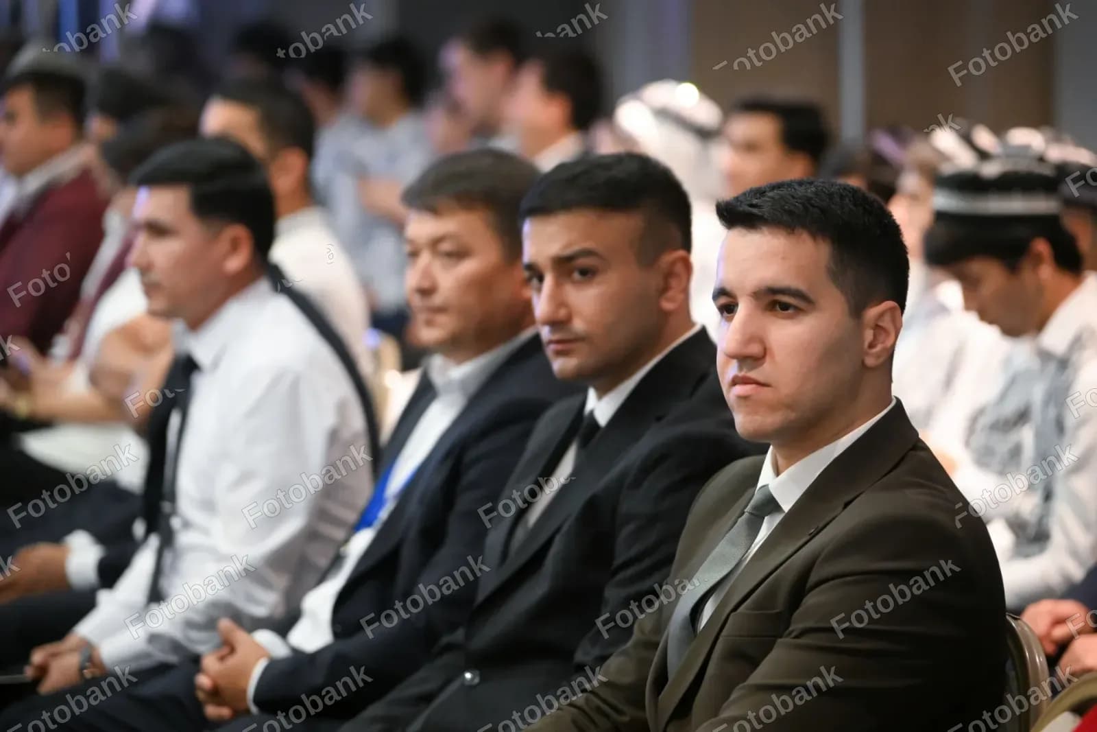 Men attending a formal conference