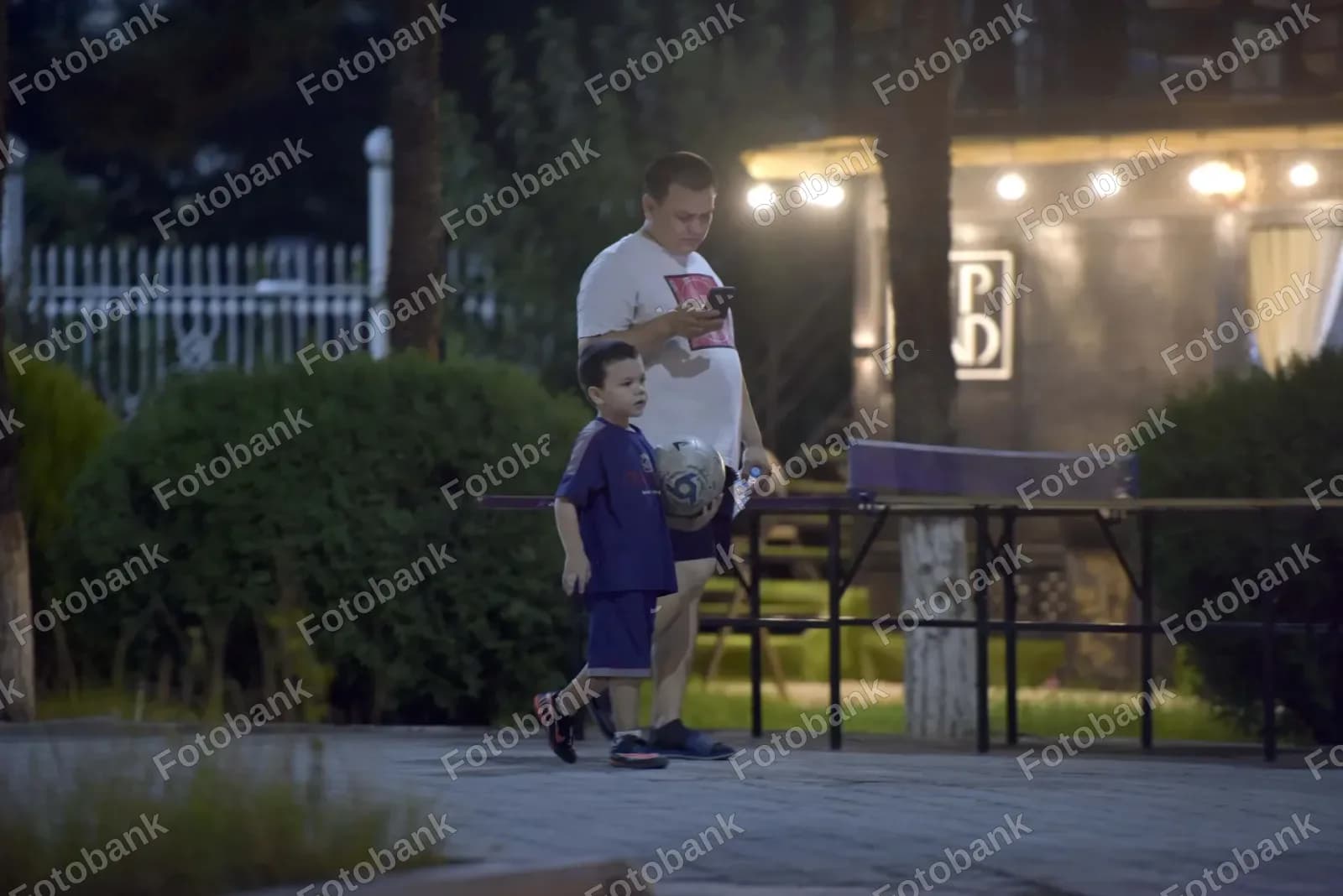 Father and son walking outdoors