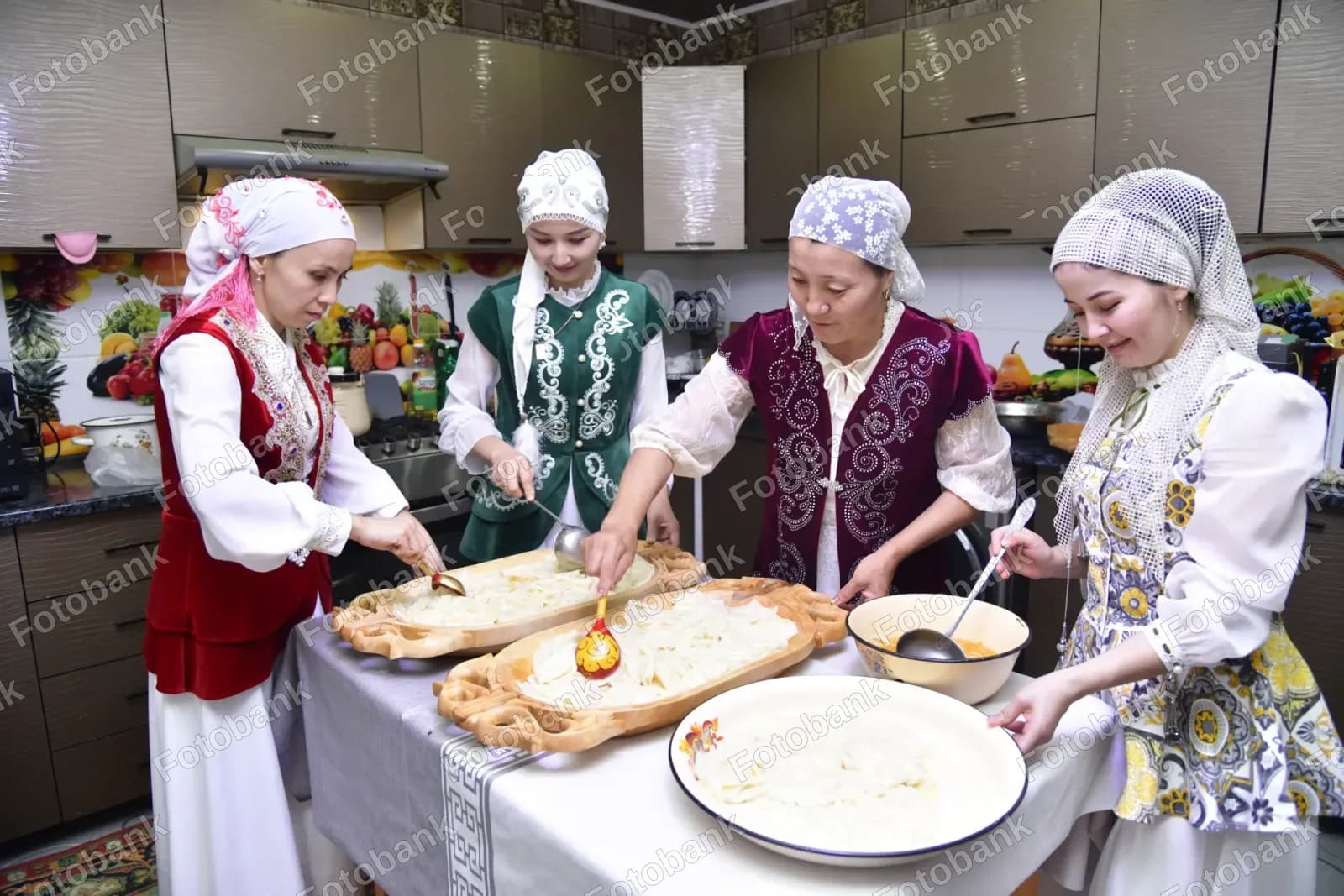 Women preparing traditional noodle dish