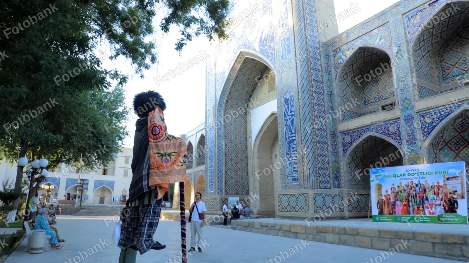Visitor explores historic mosque courtyard