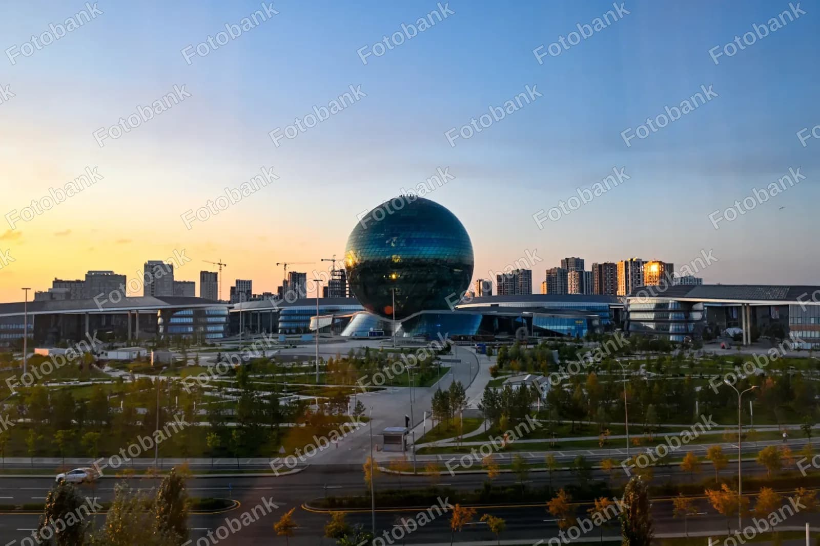Sun sets over glass sphere
