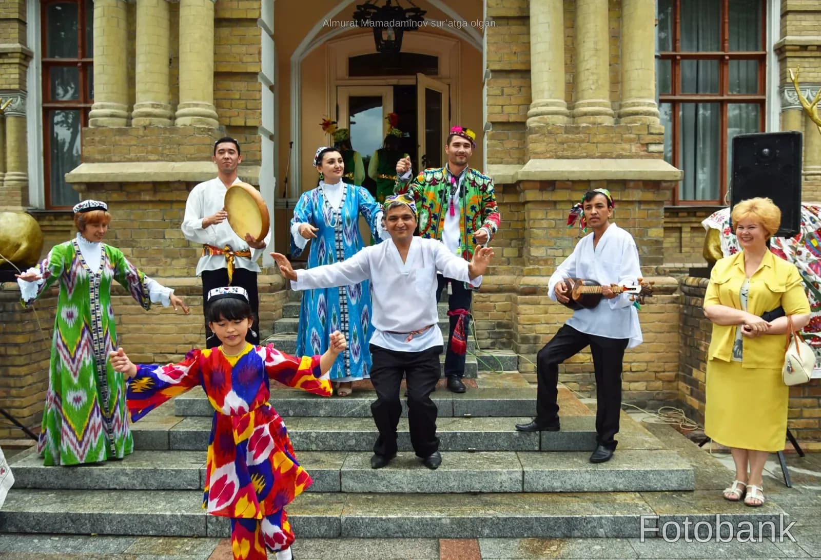 Performers dancing in traditional attire