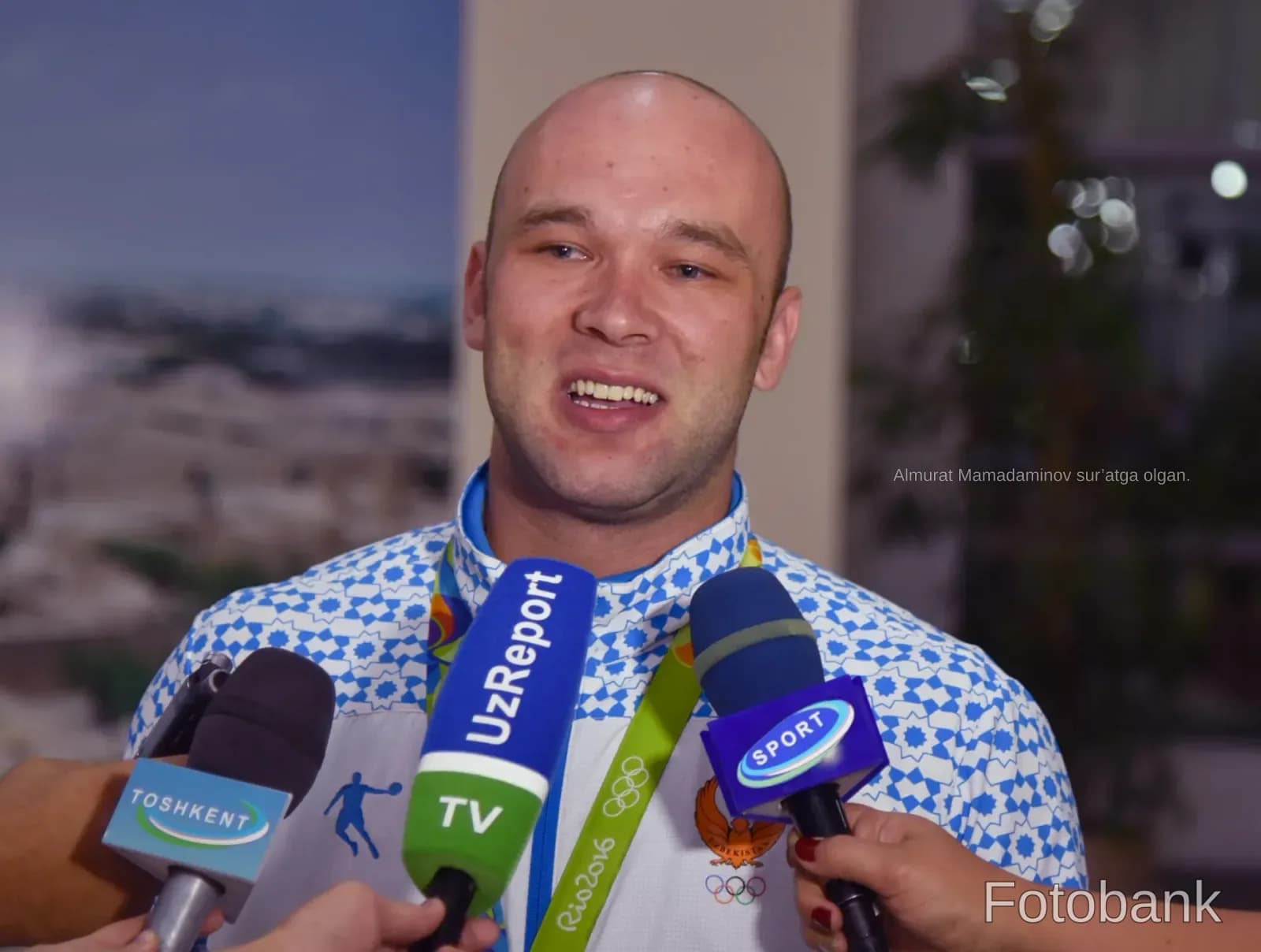 Athlete speaking to reporters