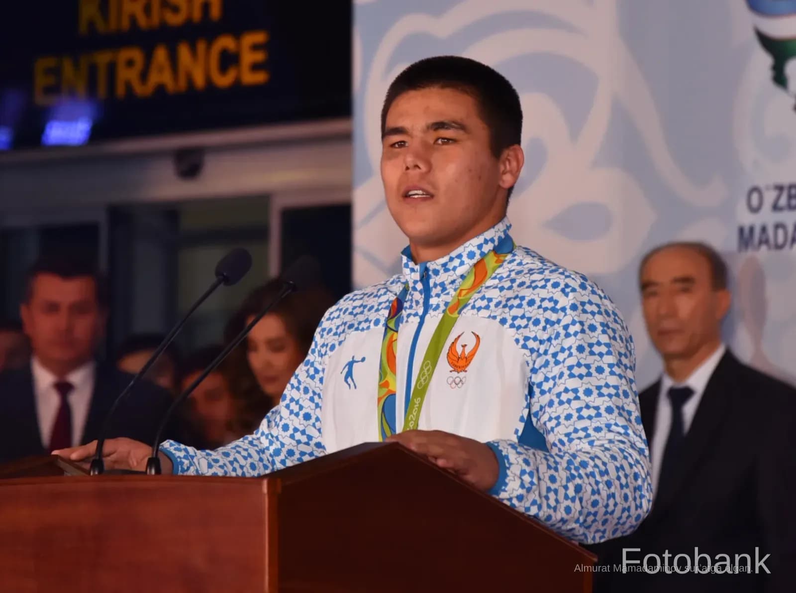 Person speaking at a podium