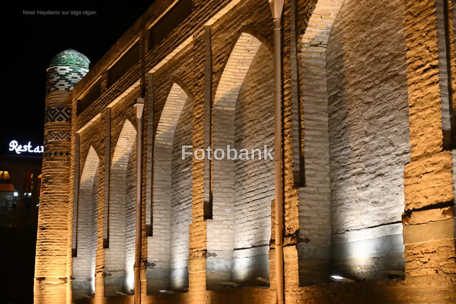 Illuminated brick architecture at night