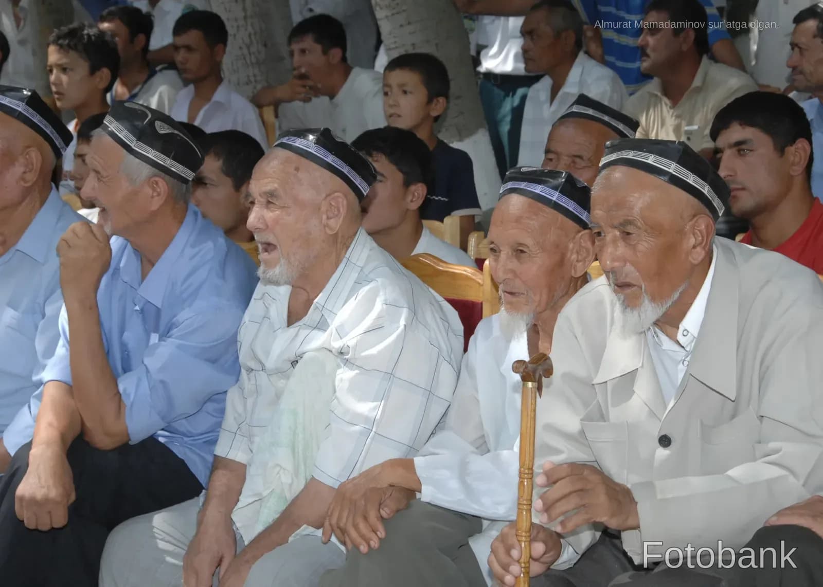 Group of men gathered together